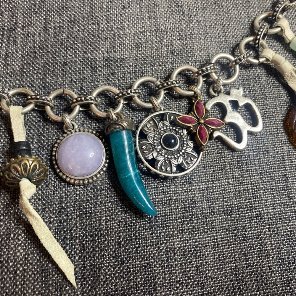 Lucky Brand silver toned toggle bracelet with 9 charms. - Picture 3 of 7